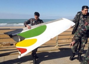 Lebanese civil defence members carry a section of the wing of an Ethiopian airliner on the shores of Beirut on January 26, a day after it crashed off Lebanon.