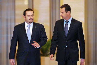 Lebanese Prime Minister Saad Hariri is shown with Syrian president Bashar al Assad in Damascus in December 2009 
