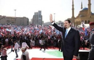 Lebanon's Prime Minister Saad al-Hariri greets his supporters during a rally to mark the fifth anniversary of the assassination of his father