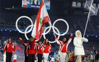 Three athletes from Lebanon are competing in the 2010 Vancouver Winter Olympic Games - all skiers. Three-time Olympian Chirine Njeim (25) carries the flag, walking alongside teammates Jacky Chamoun (18) and Ghassan Achi (16). Getty Images