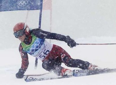 Lebanon's Chirine Njeim skis through thick fog during the first run of the women's alpine skiing Giant Slalom event at the Vancouver 2010 Winter Olympics on February 24, 2010 (Reuters)