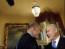 Sen. Charles Schumer (D-N.Y.) greets Israeli Prime Minister Binyamin Netanyahu, right, on Capitol Hill