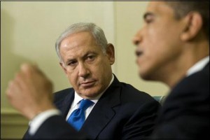 US President Barack Obama (R) speaks with Israeli Prime Minister Benjamin Netanyahu during a meeting in the Oval Office of the White House in Washington, DC