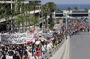 Lebanese take part in a rally calling for Secularism in downtown Beirut on April 25, 2010. Thousands of Lebanese marched to parliament in Beirut in a peaceful rally demanding the secularisation of a state long built on sectarianism