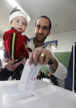 A Lebanese man casts his ballot during the municipal elections in the mountain town of Baalchmay, east of Beirut