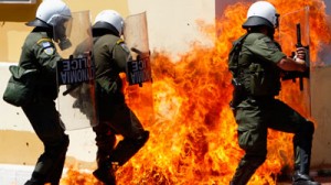 Greek police dodge a petrol bomb in Athens