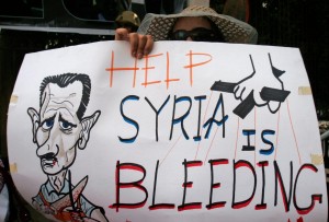 anti assad poster- syria is bleeding