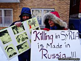 syrian poster- killings in syria is made in  Russia