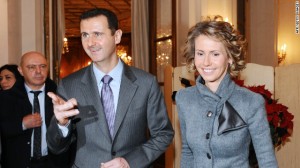 Bashar al-Assad and his wife Asma at an exhibition in Paris in 2010