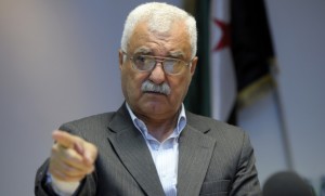 George Sabra, a member of the Syrian National Council leadership and official spokesman, attends a news conference in Paris