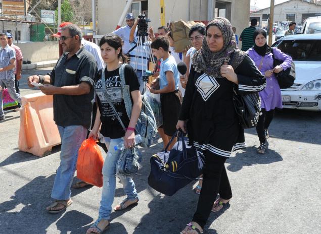 syrian refugees cross into Lebanon july 2012