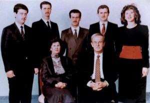 Standing, from left to right: Maher, Bashar, Basel, Majd, and Bushra al-Assad. Seated are First Lady Anisa Makhlouf and President Assad -