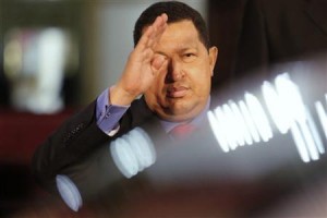 Venezuela's President Chavez waves to Rosneft Chief Executive Sechin of Russia after a visit at Miraflores Palace in Caracas