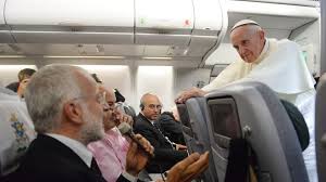 Pope Francis  made his comments about gays, signaling that the church looks on them as brothers and sisters, as he fielded questions from reporters for an 80-minute stretch, at times leaning on the back of an airplane seat as if he were just another passenger.