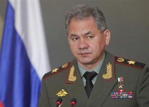 Russia's Defence Minister Shoigu speaks while attending a news conference after a meeting with his Vietnamese counterpart Phung in Hanoi