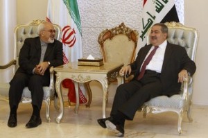 Iran's Foreign Minister Mohammad Javad Zarif meets with his Iraqi counterpart Hoshyar Zebari (R) at the Baghdad airport September 8, 2013. Zarif visited Iraq on Sunday to discuss what he called the "dangerous situation" in Syria and the wider region.   REUTERS/ Saad Shalash  (IRAQ - Tags: POLITICS)