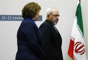 European Union foreign policy chief Ashton arrives with Iranian Foreign Minister Zarif during photo opportunity before start of three days of closed-door nuclear talks at United Nations European headquarters in Geneva