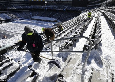 Workers shovel out MetLife Stadium in East Rutherford, New Jersey where the Super Bowl will be held on February 2. Another winter storm is scheduled to hit just one or two days before the big game 