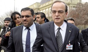 Syrian opposition negotiator Hadi al-Bahra and coalition member Anas al-Abda arrive at peace talks