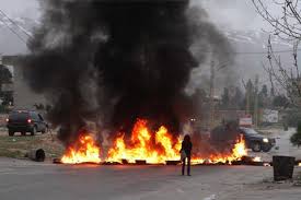 hezbollah protest hermel tires on fire