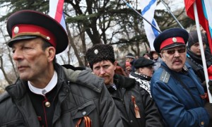 Pro-Russian Cossacks rally outside the Crimean parliament building in Simferopol, Ukraine
