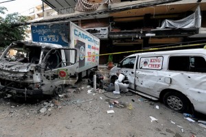 DAHIYE - The aftermath of a Jan. 21 car bomb in Beirut. European Pressphoto Agency