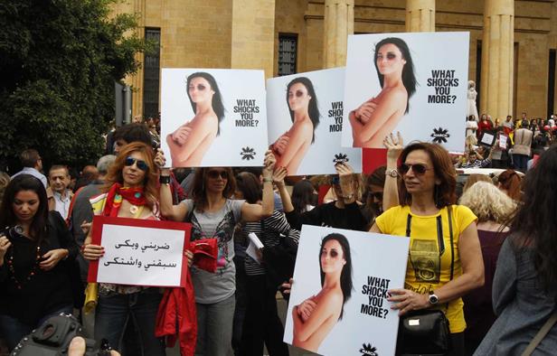 Hundreds of Lebanese citizens marched in Beirut on Saturday  March 8, 2014 to demand the implementation of a draft law criminalizing abuse against women on the occasion of International Women’s Day.