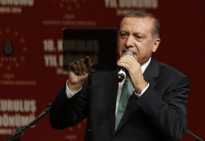 Turkish Prime Minister Tayyip Erdogan speaks to supporters during his visit in Cologne May 24, 2014.            REUTERS/Wolfgang Rattay