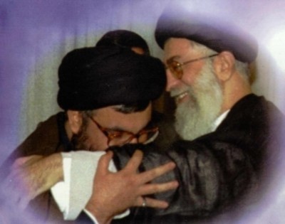 Hezbollah chief Hassan Nasrallah  ( L) and Iranian supreme leader Ali  Khamenei  