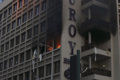 Fire is seen from the windows of Duroy hotel following a bomb attack in Raouche, in western Beirut June 25, 2014.    REUTERS/Mahmoud Kheir
