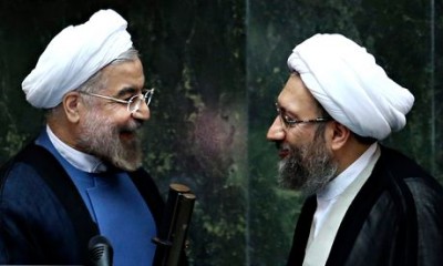 Iranian President Hassan Rouhani, left, with judiciary chief Sadeq Larijani