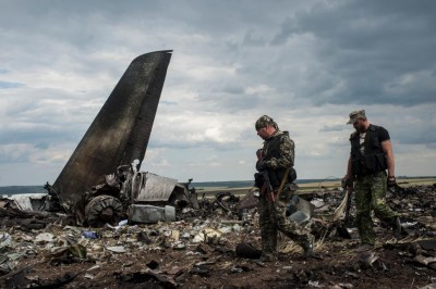 Pro-Russia separatists shot down a Ukrainian military transport plane Saturday, killing all 49 crew and troops aboard in a bloody escalation of the conflict in the country's restive east.