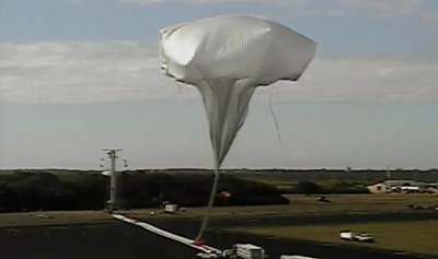 This image provided by NASA shows the launch of the high-altitude balloon carrying a saucer-shaped vehicle for NASA, to test technology that could be used to land on Mars, Saturday June 28, 2014 in Kauai, Hawaii. Saturday's experimental flight high in Earth's atmosphere is testing a giant parachute designed to deliver heavier spacecraft and eventually astronauts. (AP Photo/NASA)