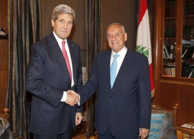 Secretary of State John Kerry shakes hands with Lebanese parliament speaker Nabih Berri in Beirut, Wednesday, June 4, 2014. The political stalemate that has left Lebanon without a president at a turbulent time in the region is "deeply troubling," Kerry said Wednesday. He also announced new aid to cope with the Syrian refugee crisis that has spilled over into its besieged neighbor. (AP Photo/Mohamed Azakir, Pool)