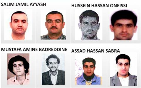 Wanted posters for four of  the   five Hezbollah men  who were indicted in 2011 in the 2005 murder of former Lebanese Prime Minister Rafik Hariri