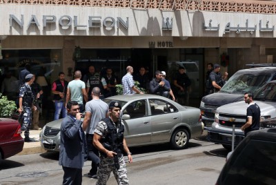 Lebanese security forces surrounded the Napoleon Hotel and detained 12 men on Friday in Beirut. Credit Bilal Hussein/Associated Press