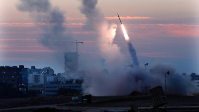 The Israeli Iron Dome system fires to intercept incoming missiles from Gaza. 