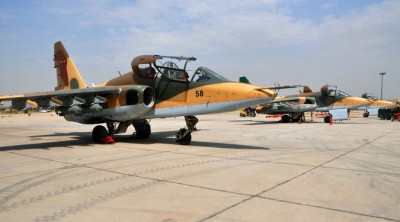 Russian Sukhoi Su-25 planes on the tarmac at Al Muthanna military base in Baghdad last week.  The planes were sent from Iran. Credit Reuters