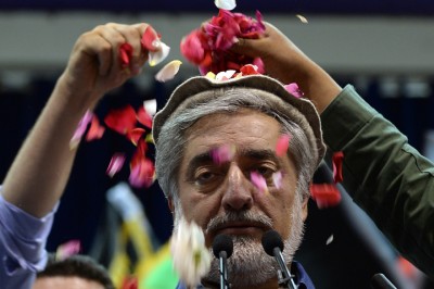 Abdullah Abdullah, an Afghanistan presidential candidate, showered with rose petals by supporters. Photo: AFP/Getty Images