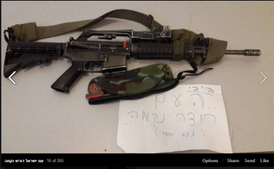 A gun and an army beret with a sign reading: "Bibi... the people want revenge.." At the bottom appear the words Netzach Yehuda, the name of a haredi IDF company.