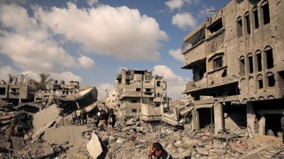 A man grieves at the site of his home in the Shajaiya neighborhood of Gaza City, which has seen some of the heaviest bombardment by Israeli forces. There was nothing left for him to recover. (Carolyn Cole, Los Angeles Times)