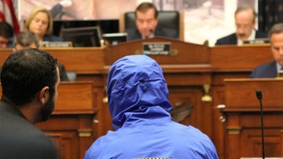 July 31, 2014: A Syrian defector who goes only by the name 'Caesar,' and who wore a hood to obscure his face, testifies before the House Foreign Affairs Committee.FNC