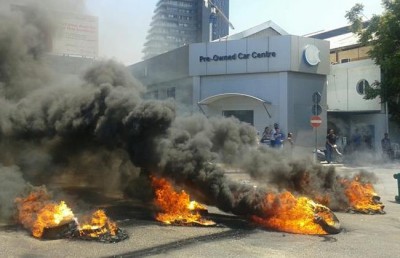 Electricite Du Liban (EDL ) Contract workers burn tires on  on the  highway  Highway in Beirut that leads to EDL headquarters 