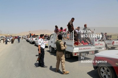 Iraqi Yazidis flee from Sinjar.  Yazidis are a Kurdish ethno-religious community, representing an ancient religion that is linked to Zoroastrianism.