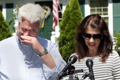 James Foley's parents, John and Diane Foley, after speaking with President Obama on Wednesday. Credit Jim Cole/Associated Press
