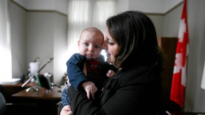 NDP MP Sana Hassainia with her three month old baby Skander-Jack Kochlef in her office on Parliament Hill in Ottawa. (Dave Chan/The Globe and Mail)