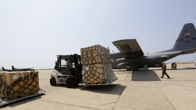A forklift moves a shipment of weapons that was delivered by a US air force plane on August 29, 2014 at a Lebanese military base at Beirut International Airport. The United States is supplying Lebanon's army with additional munitions and ordnance in a bid to bolster the force after clashes with jihadists in the eastern Arsal region of the country, on the Syrian border. AFP PHOTO/ANWAR AMRO