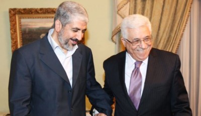 Khaled Meshal, political leader of Hamas, left, is shown with Palestinian President Mahmoud Abbas in Cairo Egypt, December 21, 2011. Photo by AP
