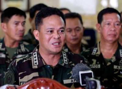 Philippine military chief Gen. Gregorio Pio Catapang answers questions from reporters about the situation of Filipino peacekeepers in Golan Heights, during a press conference at Camp Aguinaldo military headquarters in suburban Quezon city, Philippines on Sunday Aug. 31, 2014.Catapang said more than 70 Filipino peacekeepers have escaped from two areas in the Golan Heights that came under attack by Syrian rebels.