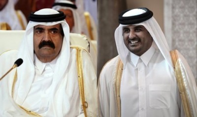 Qatar's Emir Hamad bin Khalifa al-Thani (L), and his son, Crown Prince Sheikh Tamim. Sheikh Hamad abdicated in favour of his 33-year-old son. (AFP)